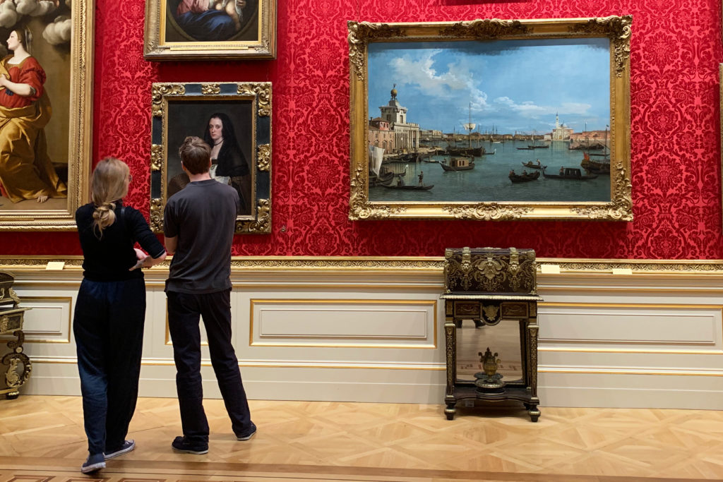 Young people looking at paintings at the Wallace Collection